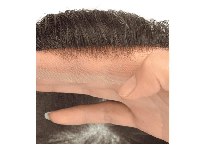 attaccatura naturale di una protesi capelli in base di lace